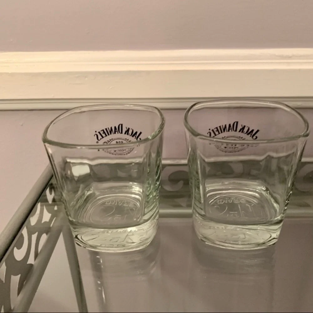 3 bar glasses including 2 square Jack Daniels and 1 Gentlemen Jack tumbler
